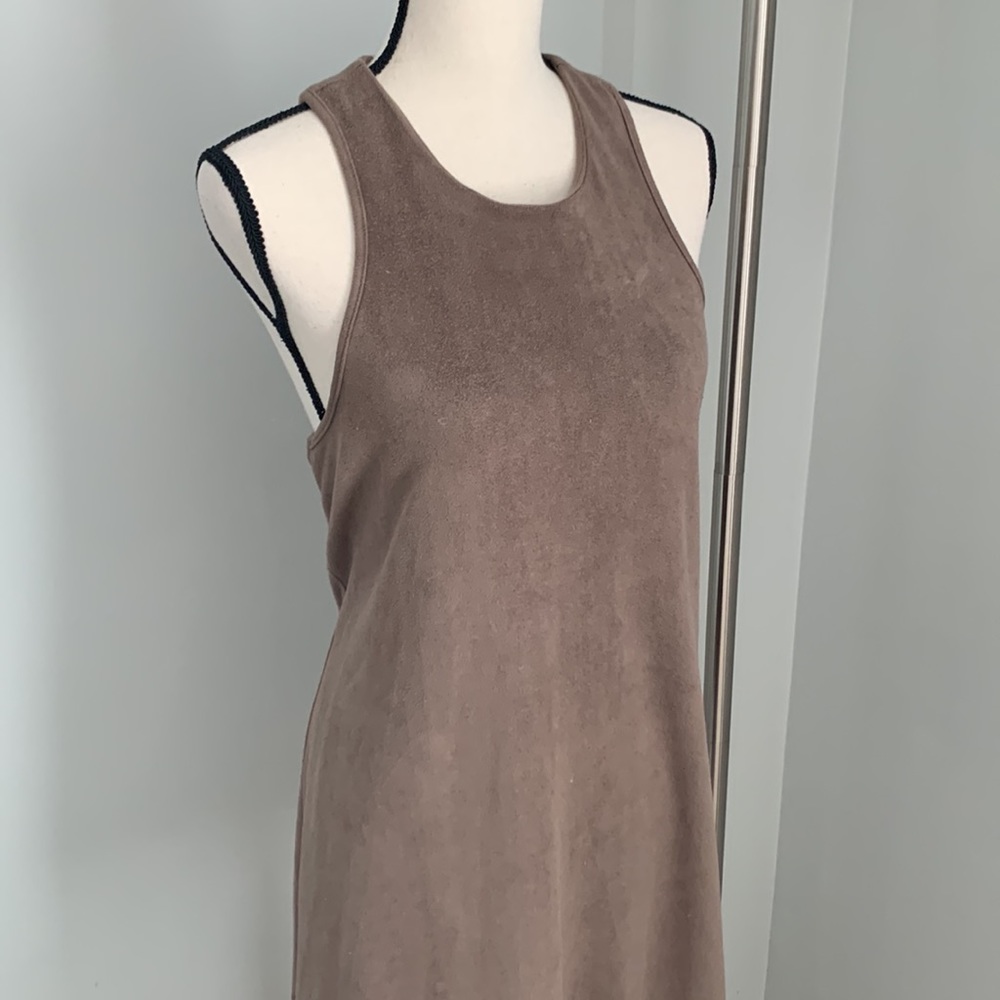 Racer back dress with beautiful islet detail at hem